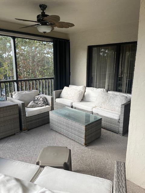 interior space featuring a ceiling fan