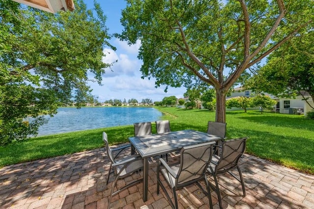 view of patio featuring a water view