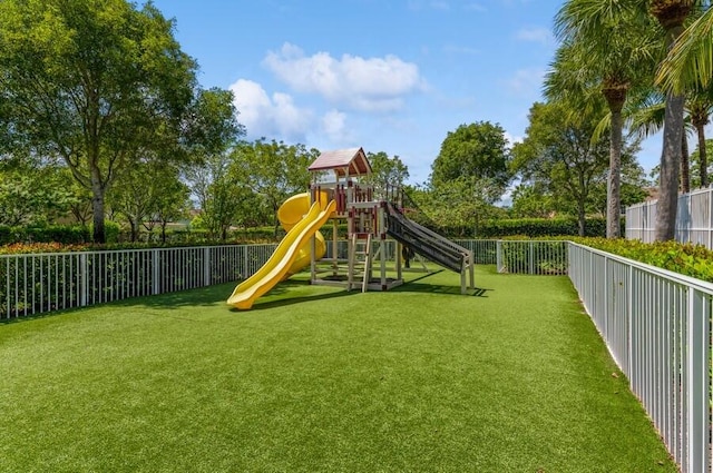 view of playground featuring a lawn