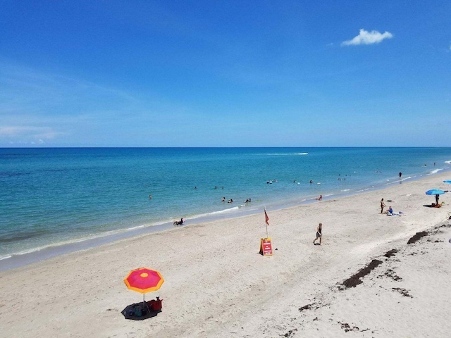 property view of water with a beach view