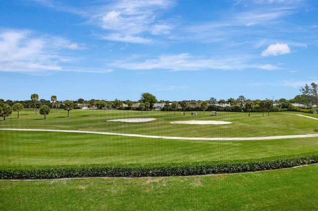 surrounding community featuring a lawn