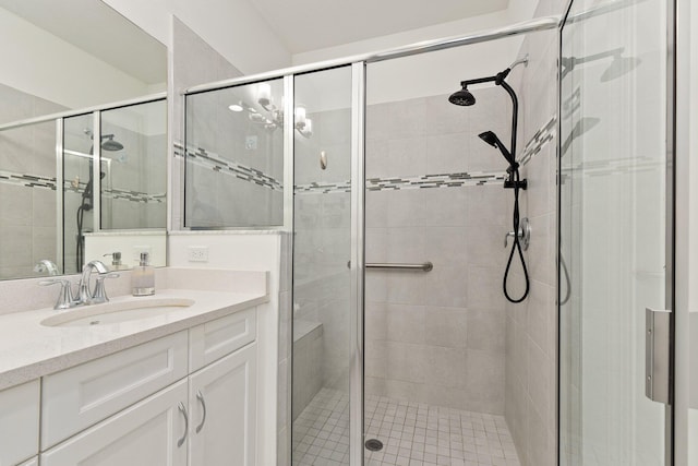 bathroom with vanity and walk in shower