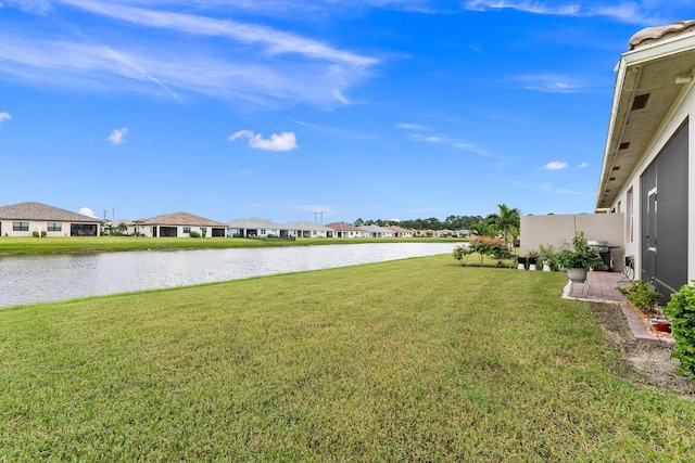 view of yard with a water view