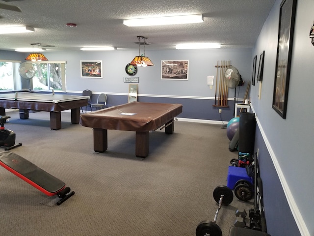 playroom featuring carpet flooring, a textured ceiling, and billiards