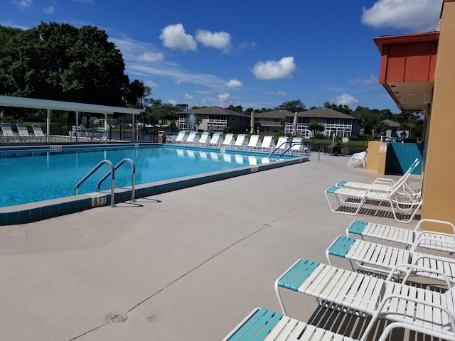 view of pool with a patio area