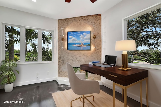 office featuring hardwood / wood-style floors and ceiling fan