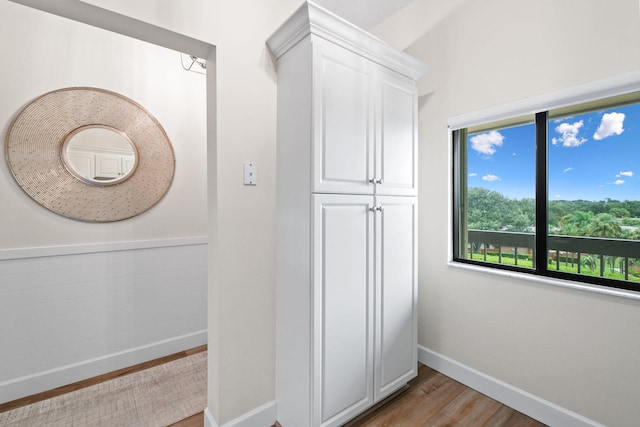 hallway featuring hardwood / wood-style floors