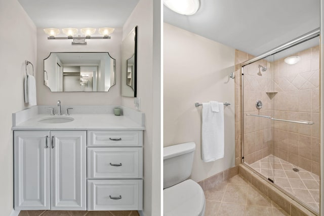 bathroom with tile patterned flooring, vanity, toilet, and a shower with door