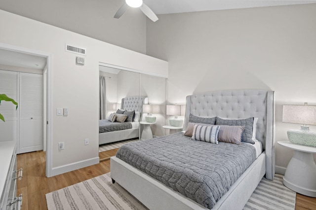 bedroom featuring ceiling fan and light wood-type flooring