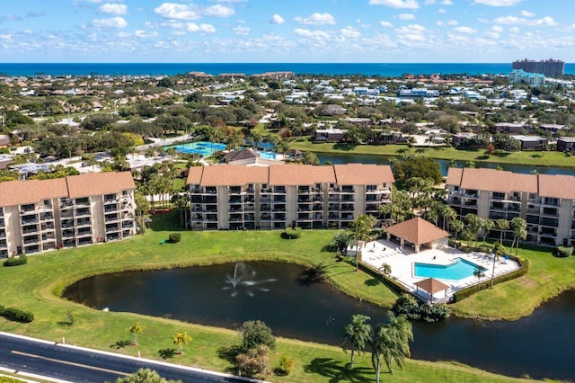 birds eye view of property featuring a water view