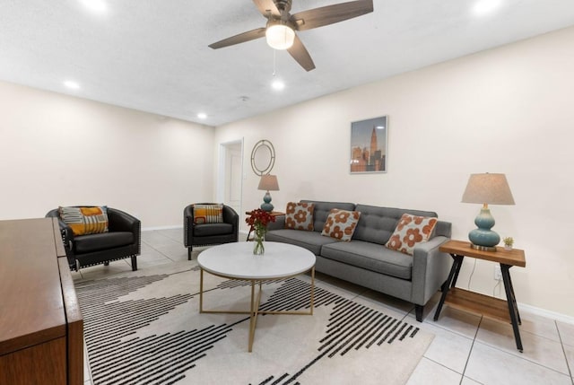 tiled living room featuring ceiling fan