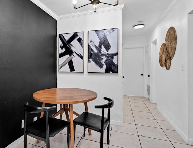 dining room featuring light tile patterned floors and ornamental molding