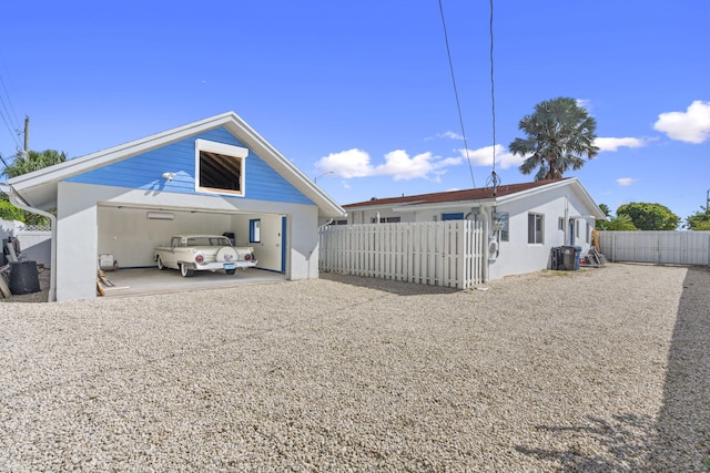 rear view of house with a carport