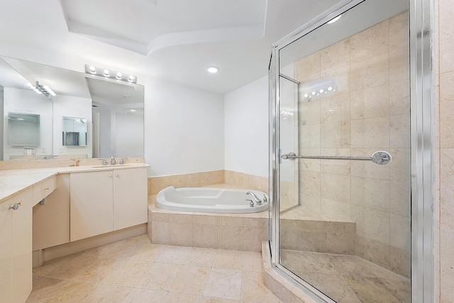 bathroom featuring tile patterned floors, vanity, and separate shower and tub