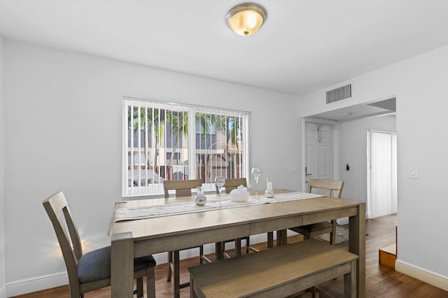 dining room featuring dark wood-type flooring