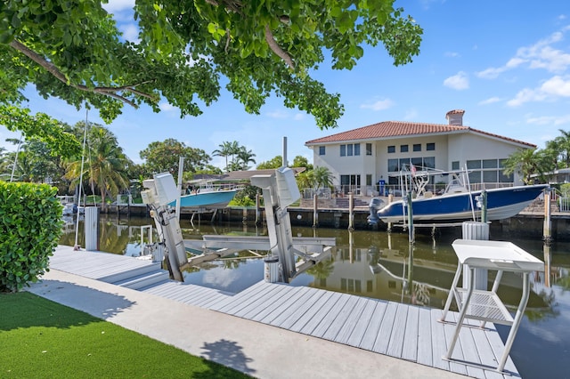 view of dock with a water view