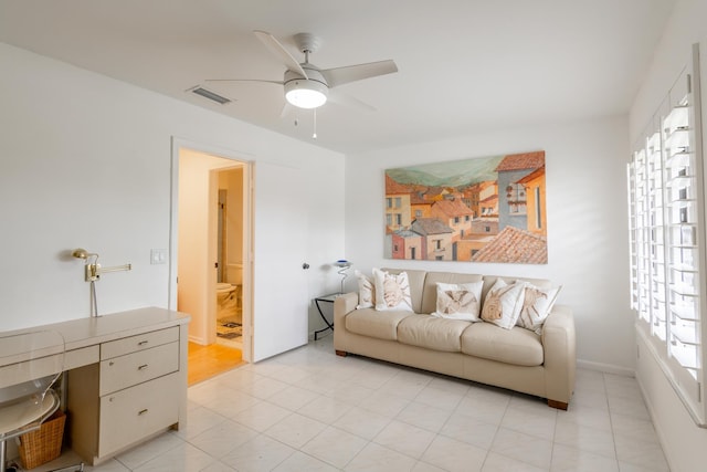 living room featuring ceiling fan