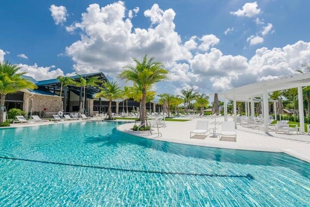 view of swimming pool with a patio area