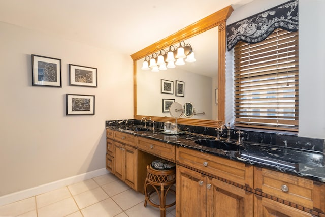 bathroom with vanity and tile patterned flooring