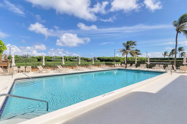 view of pool featuring a patio area