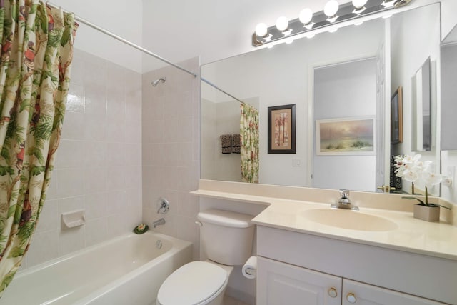 full bathroom featuring toilet, shower / bath combo with shower curtain, and vanity