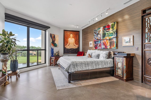 bedroom featuring multiple windows