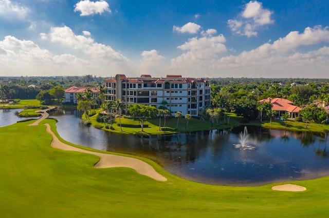 surrounding community featuring a water view