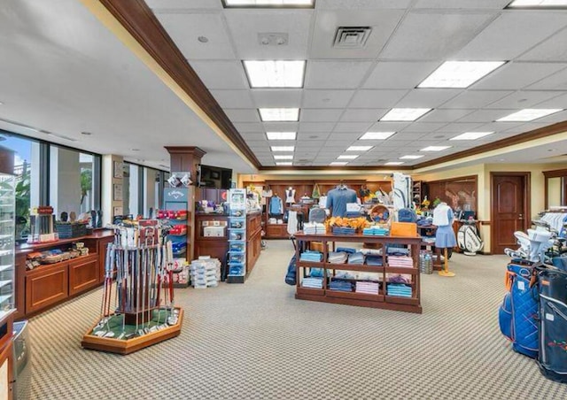 miscellaneous room with light colored carpet and a drop ceiling