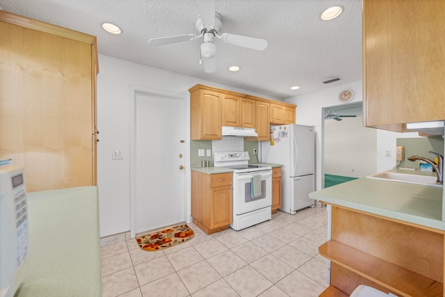 kitchen with ceiling fan, light tile patterned floors, sink, white appliances, and a textured ceiling