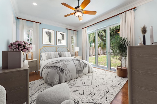 bedroom featuring ornamental molding, ceiling fan, access to exterior, and dark hardwood / wood-style flooring