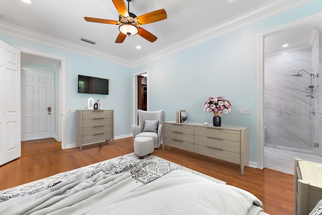 bedroom with ceiling fan, ornamental molding, and dark wood-type flooring