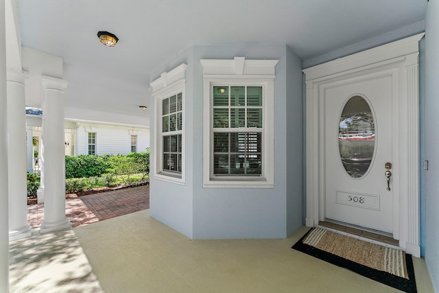 property entrance with a porch