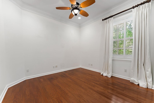 spare room featuring ornamental molding, ceiling fan, and dark wood-type flooring