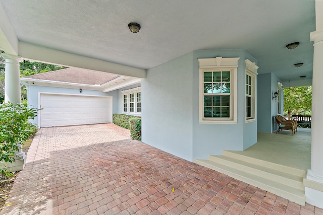 exterior space featuring a garage