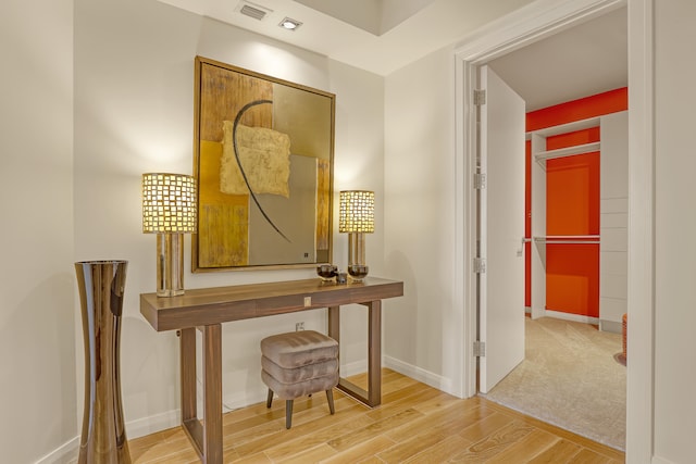 hallway featuring wood-type flooring