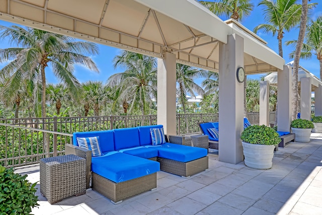 view of patio with outdoor lounge area and a gazebo