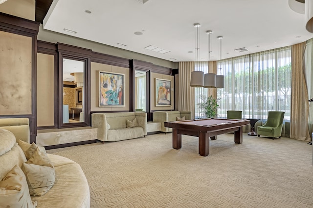 rec room with light colored carpet and pool table