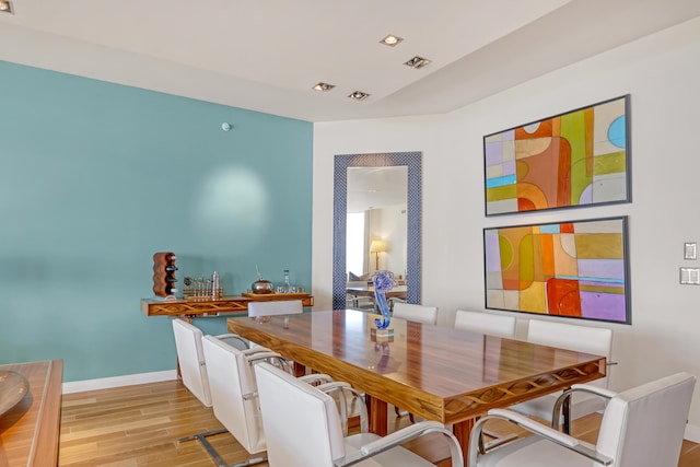 dining room with light hardwood / wood-style floors