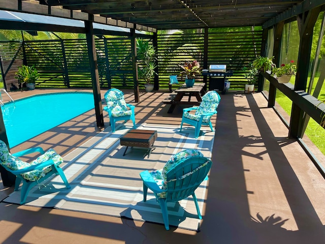 view of patio / terrace with a pergola and grilling area