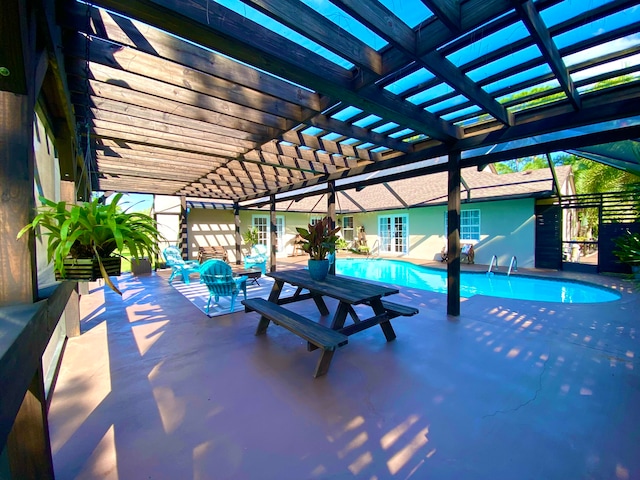 view of pool featuring a pergola and a patio