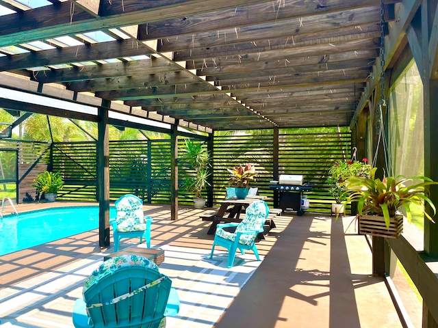 view of patio / terrace featuring a pergola and area for grilling