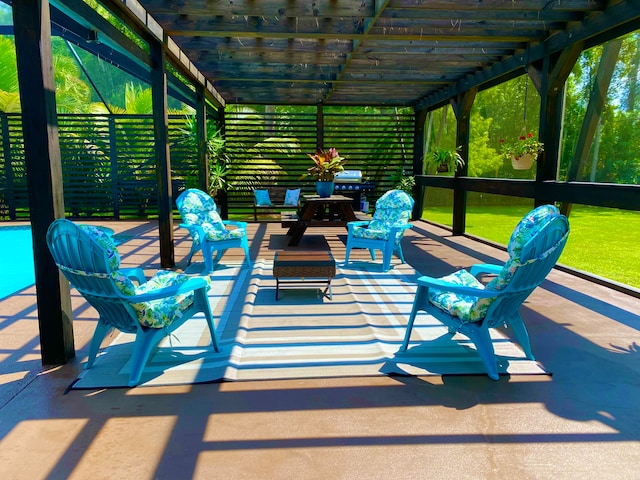 view of patio featuring a pergola