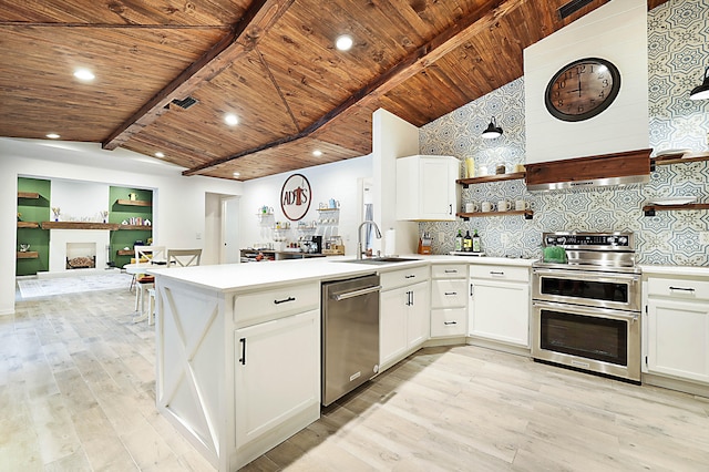 kitchen featuring stainless steel appliances, white cabinets, wooden ceiling, light hardwood / wood-style floors, and sink