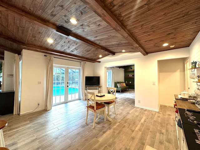 dining space featuring vaulted ceiling with beams, french doors, wood ceiling, and light hardwood / wood-style flooring