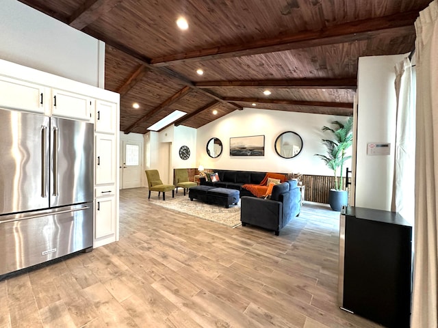 interior space with light hardwood / wood-style flooring, lofted ceiling with beams, and wooden ceiling