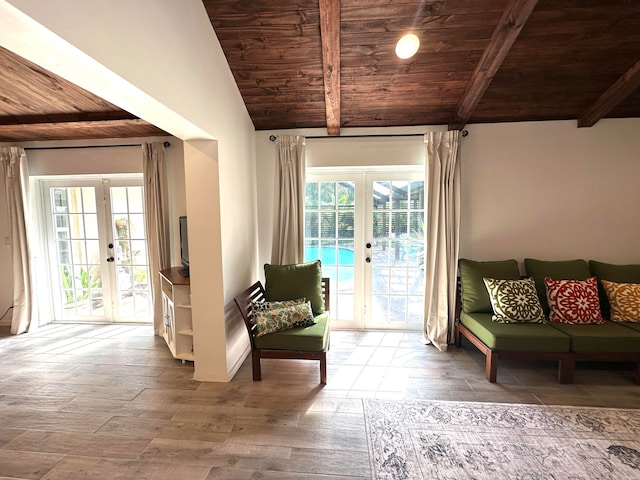 interior space with french doors, lofted ceiling with beams, light hardwood / wood-style floors, and wooden ceiling