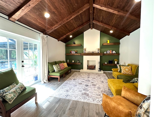 living room featuring vaulted ceiling with beams, french doors, wooden ceiling, and hardwood / wood-style flooring