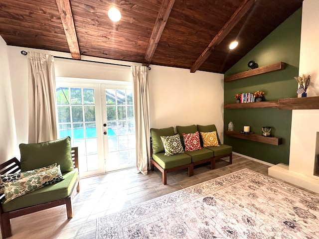 living area featuring light hardwood / wood-style flooring, vaulted ceiling with beams, french doors, and wooden ceiling