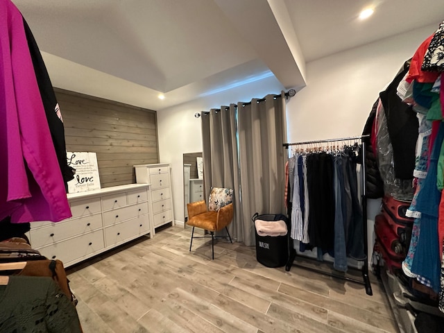 walk in closet featuring light hardwood / wood-style flooring