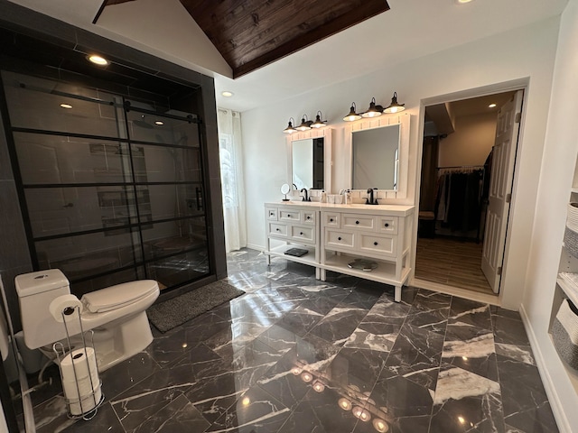 bathroom with lofted ceiling, walk in shower, vanity, and toilet